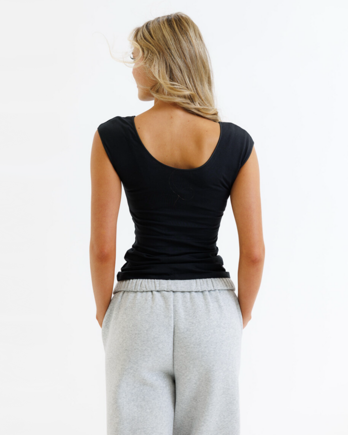 Downeast Wonder Tee in soft fabric, featuring a classic crew neck and relaxed fit, displayed on a hanger.
