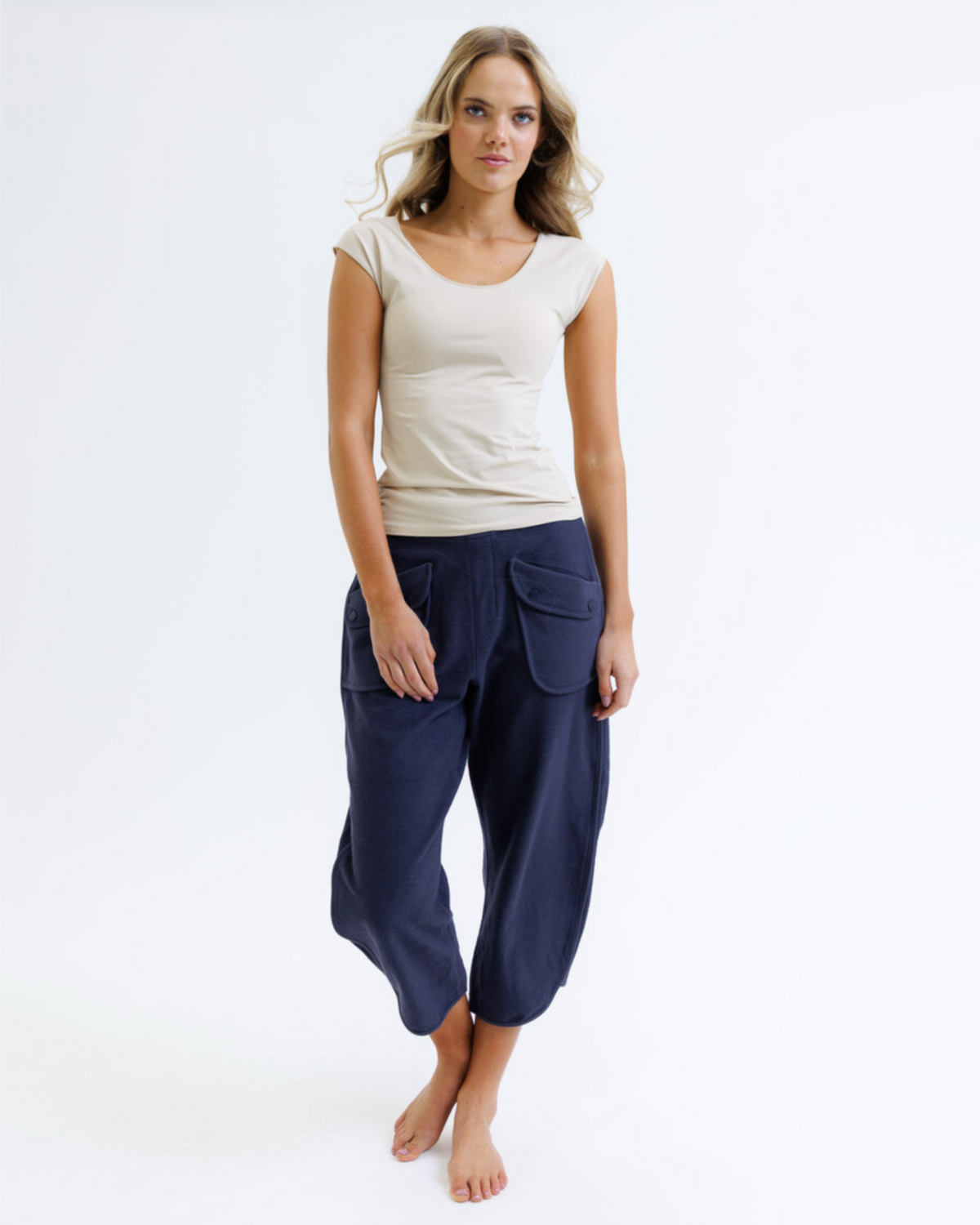 Downeast Wonder Tee in nude, soft cotton fabric, close-up of neckline and smooth fit on a mannequin.