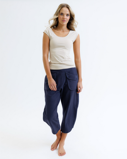 Downeast Wonder Tee in nude, soft cotton fabric, close-up of neckline and smooth fit on a mannequin.