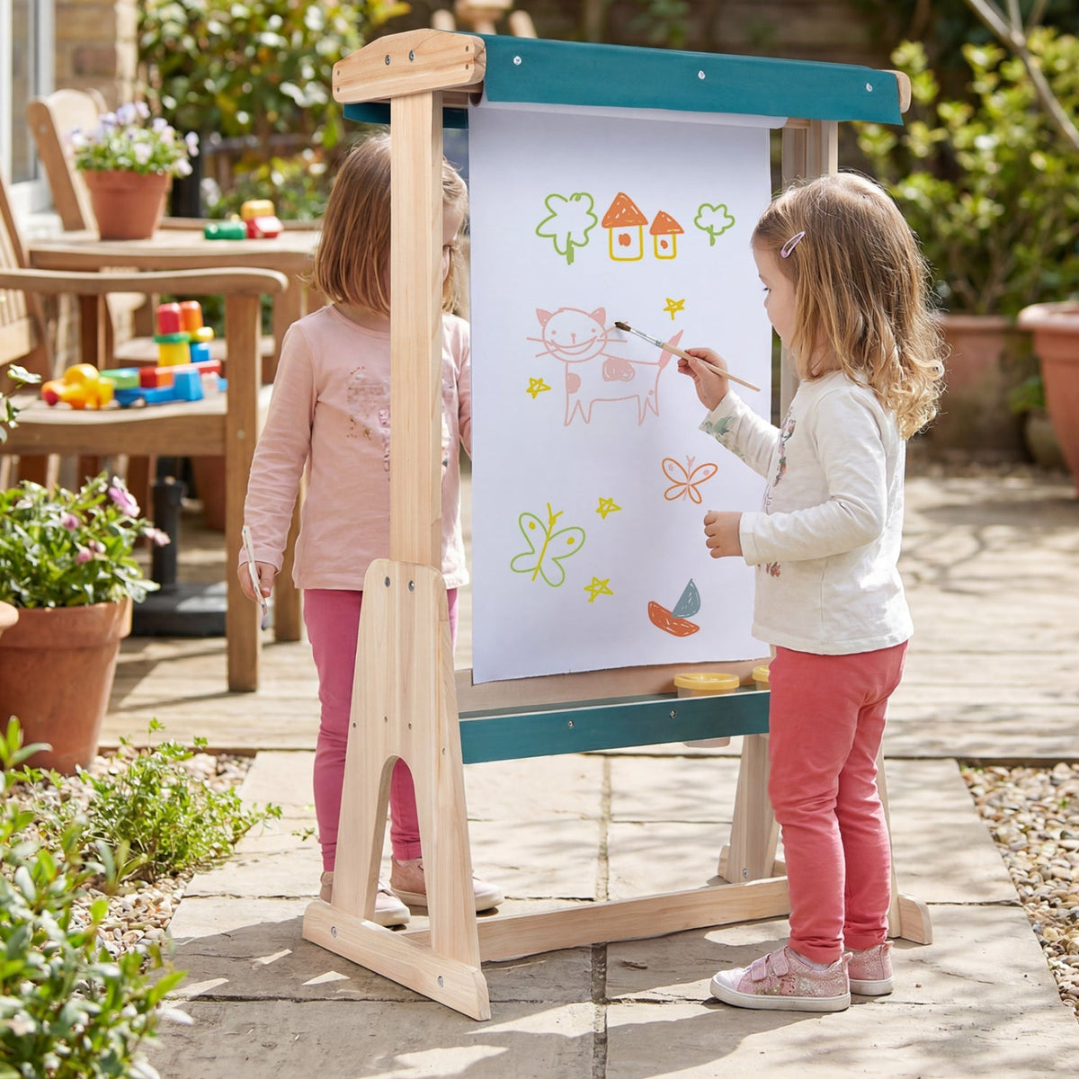 Wooden art easel for kids with canopy and paper roll, sturdy wooden frame ideal for young artists and creative activities.
