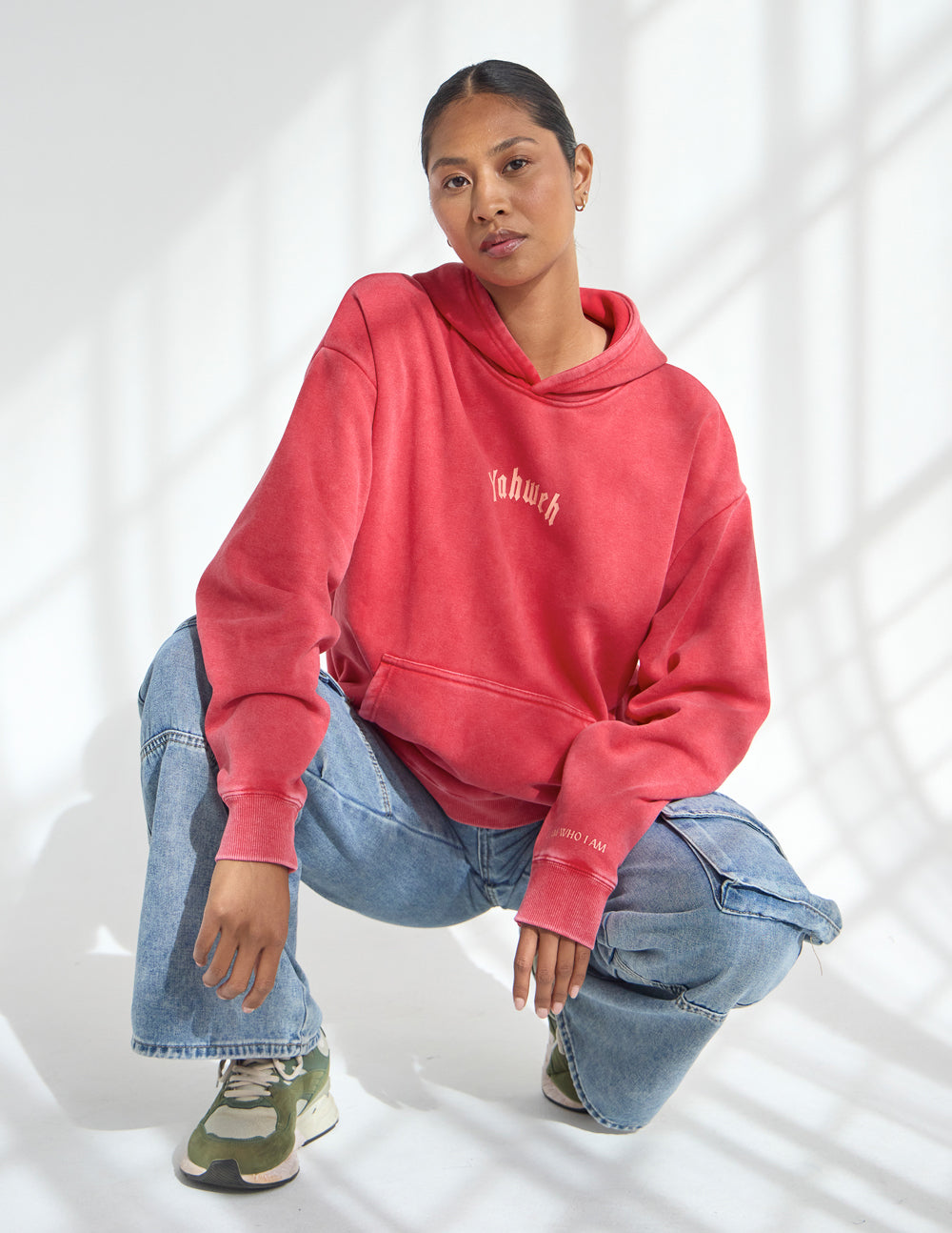 Unisex Yahweh Hoodie by Elevated Faith featuring a comfortable fit and bold religious design, ideal for casual wear.