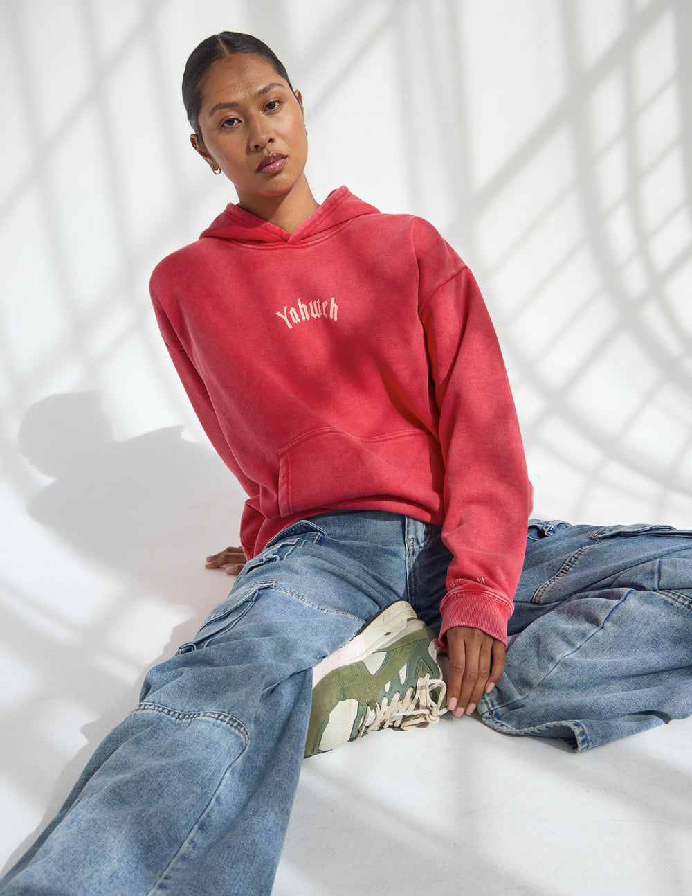 Unisex Yahweh hoodie by Elevated Faith featuring a comfortable fit and bold spiritual print on soft fabric.