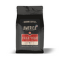Ground coffee with Yule Tide Candy Cane flavor from America Supply Company LLC, featuring festive red and white packaging.
