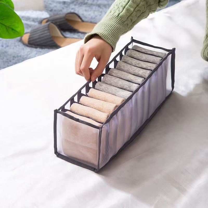 Underwear storage box made of non-woven fabric with compartment dividers