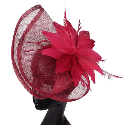 Fan-shaped handcrafted linen headpiece in natural fabric with textured pleats and a decorative, sculptural design