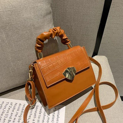BACKUPMYFILESNOW® designer women's crossbody handbag with stone pattern, featuring a compact and stylish accessory for everyday use.