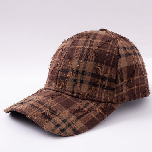 Distressed plaid baseball cap with vintage fringed fedora styling for retro streetwear and outdoor casual wear