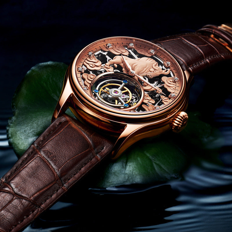Double-sided gemstone glass mechanical watch with visible watch movement and decorative dial sides