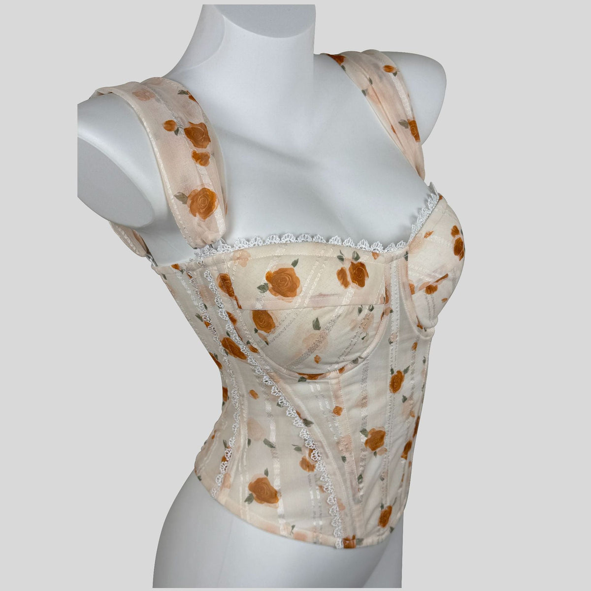 Apricot lace-trimmed underbust corset with slimming fit and spaghetti straps