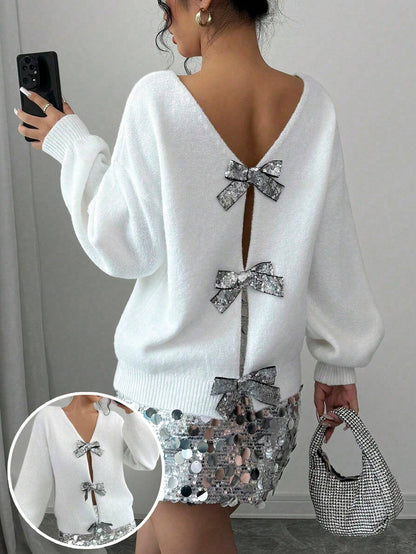 Loose knitted sweater with sequin bow accent from My Store