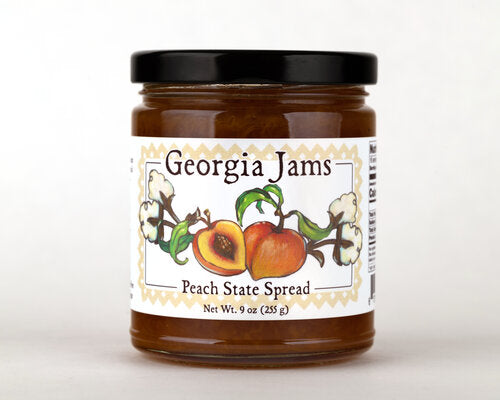Large jar of Peach State Spread jam by Georgia Jams, showing the peach-flavored jam inside a clear glass jar.
