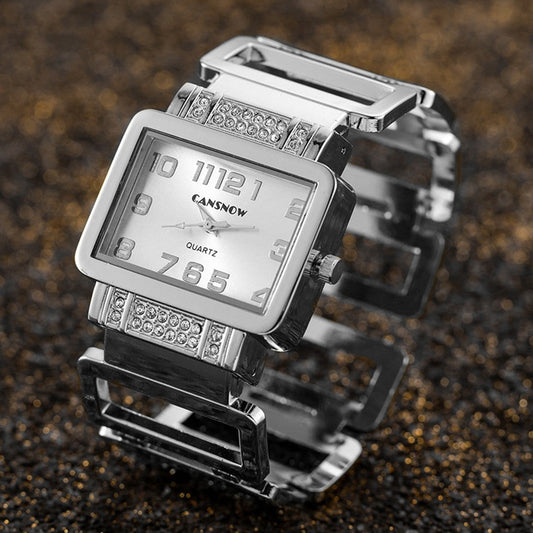 Gold and silver women's watch with a fashionable two-tone design and round dial