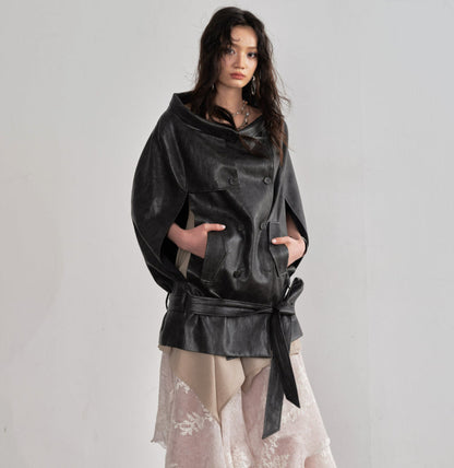 Ebony brown PU leather cloak-style cape jacket with draped silhouette and open front