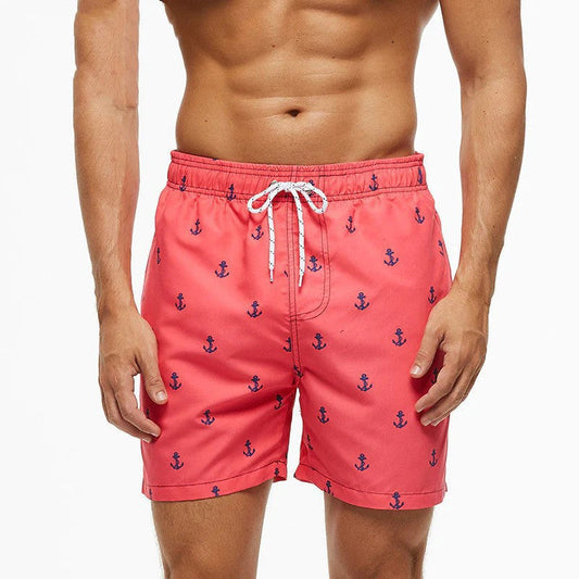 Printed men's sports beach shorts with colorful all-over pattern and drawstring waist