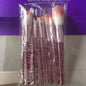 10-piece essential makeup brush kit from BACKUPMYFILESNOW® with various brushes for face and eye makeup application.