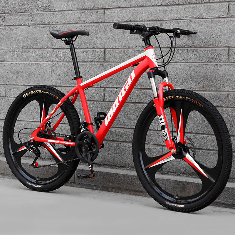 Mountain bike bicycle with disc brakes, shock absorption, and variable-speed gears in 24 or 26 inch sizes