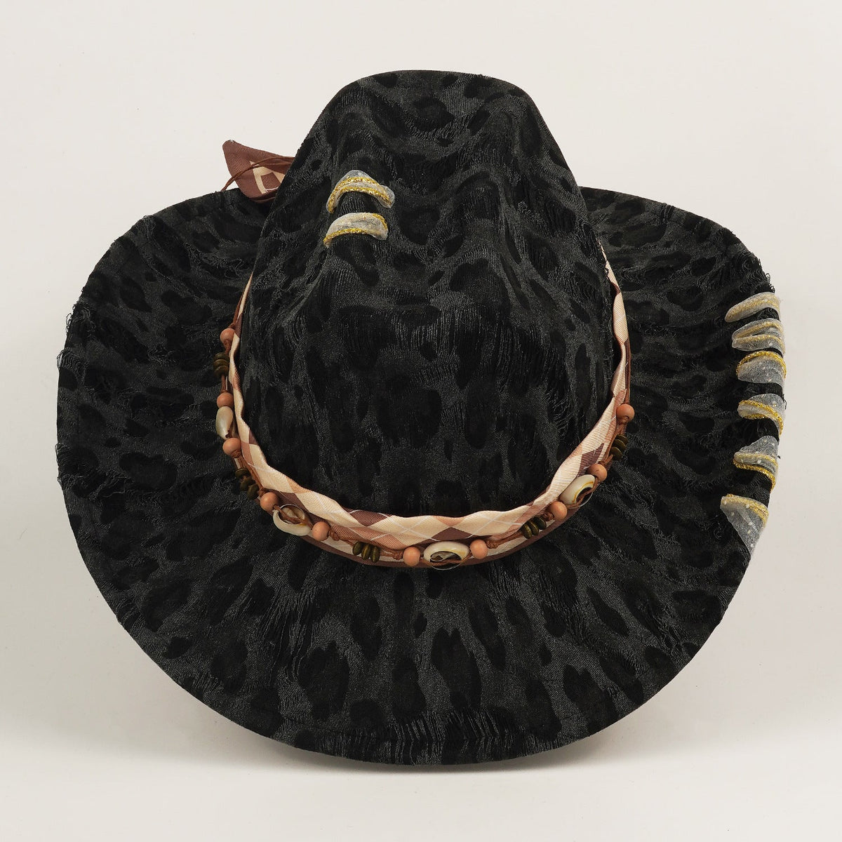 Leopard-print western cowboy hat with a tall top-hat crown and wide sun-shielding brim