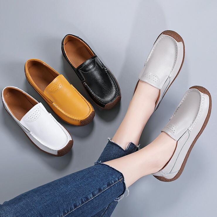 Women's cowhide leather Oxford flats by BACKUPMYFILESNOW® featuring classic lace-up design and smooth leather finish.