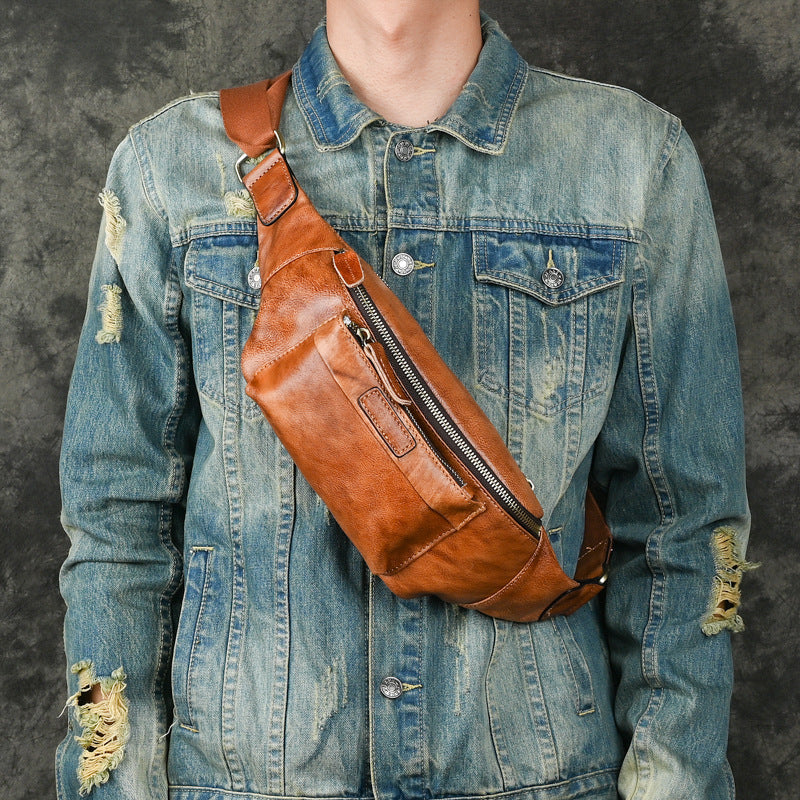 Retro casual genuine leather chest bag in brown with adjustable strap and multiple zippered pockets