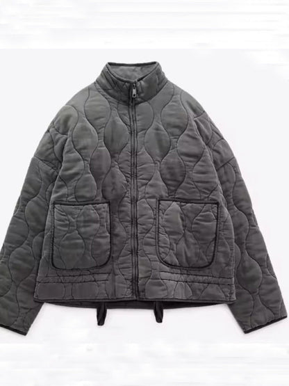 Women's diamond-quilted cotton jacket in a neutral tone, front view