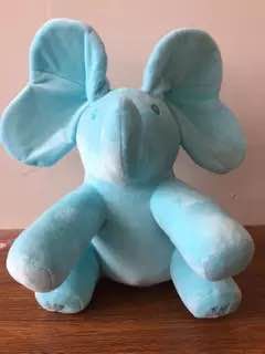 Colorful singing elephant plush toy for kids by BACKUPMYFILESNOW® featuring a friendly elephant design and playful details