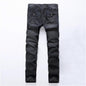 BackUPMYFILESNOW® Crossover Comfort Jeans showing a close-up of the dark denim fabric with stylish stitching and a relaxed fit.