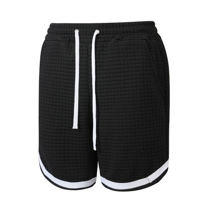 Men's sporty short shorts with plaid side panels and an athletic fit