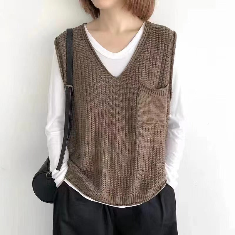 Simple V-neck artistic knit vest in a textured design, front view