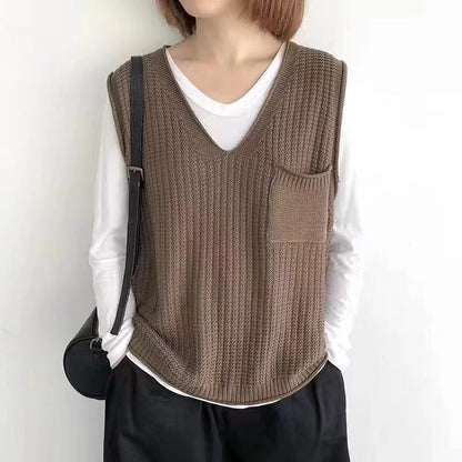 Simple V-neck artistic knit vest in a textured design, front view