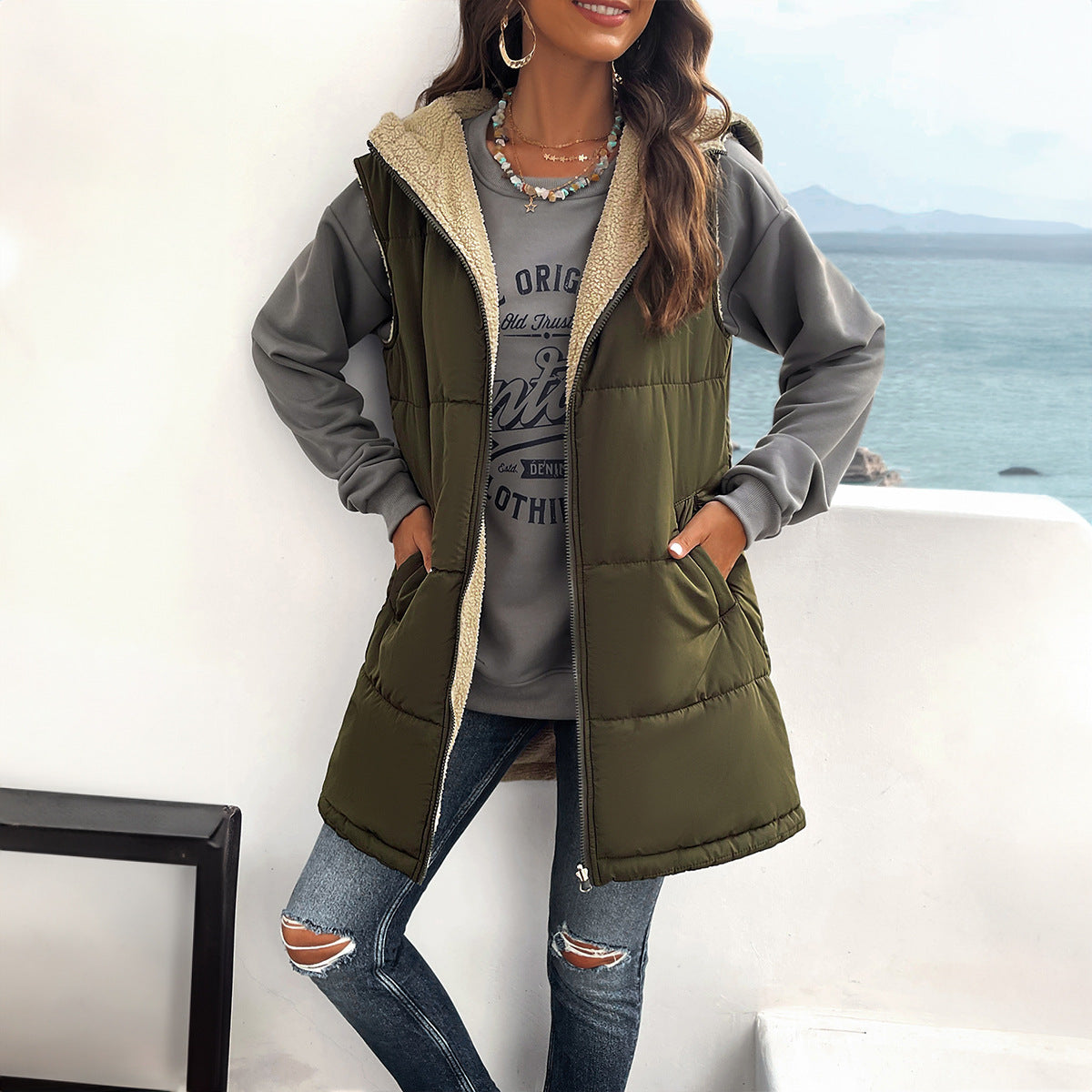 Women's mid-length hooded cotton winter vest with zipper, pockets, and fluffy warm lining