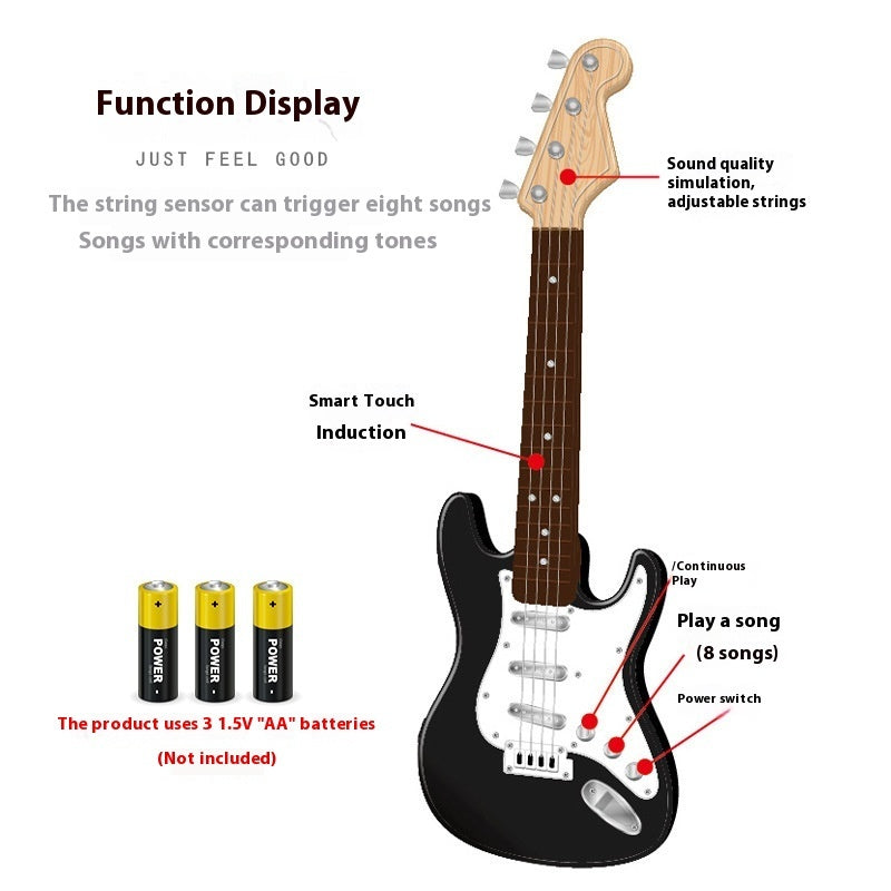 Male child playing 4-string electric guitar toy, beginner musical instrument in black and white
