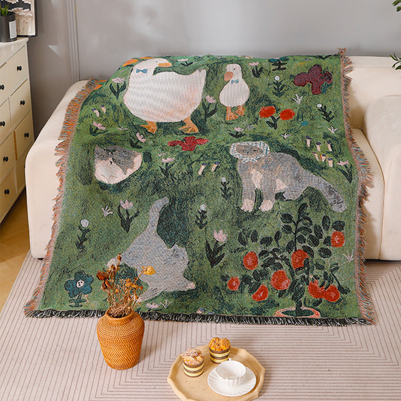 Ancient-style artistic knitted tapestry throw blanket draped over a sofa