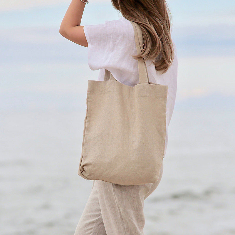 Yulu Ma eco-friendly foldable tote bag in a reusable supermarket shopping bag design