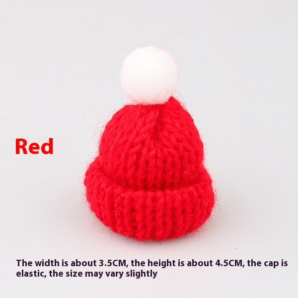 Mini Christmas scarf hat doll decoration in festive holiday attire