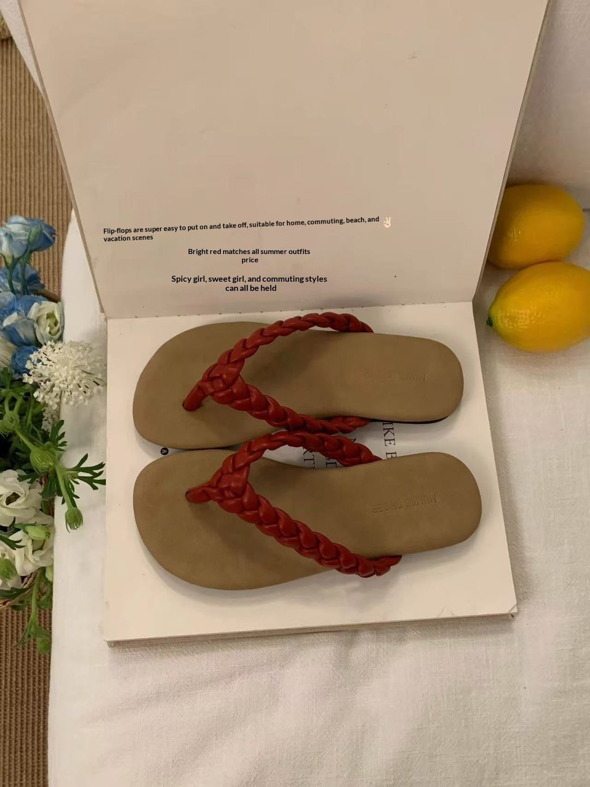 Retro flat minimalist woven flip-flops in a simple flat-lay product view