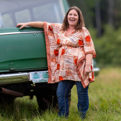 Darn Good Yarn Surplus Aanya adjustable short kaftan in eco-friendly yarn, boho style, plus size women's clothing with crochet details.
