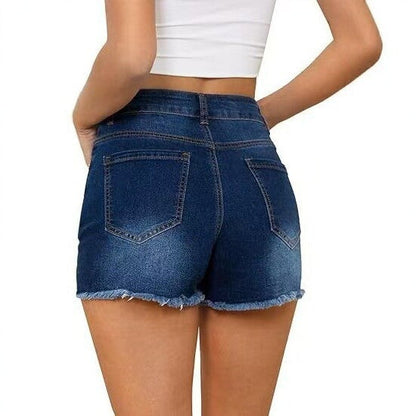 Four-way stretch denim shorts with raw-edge hem in blue, front view