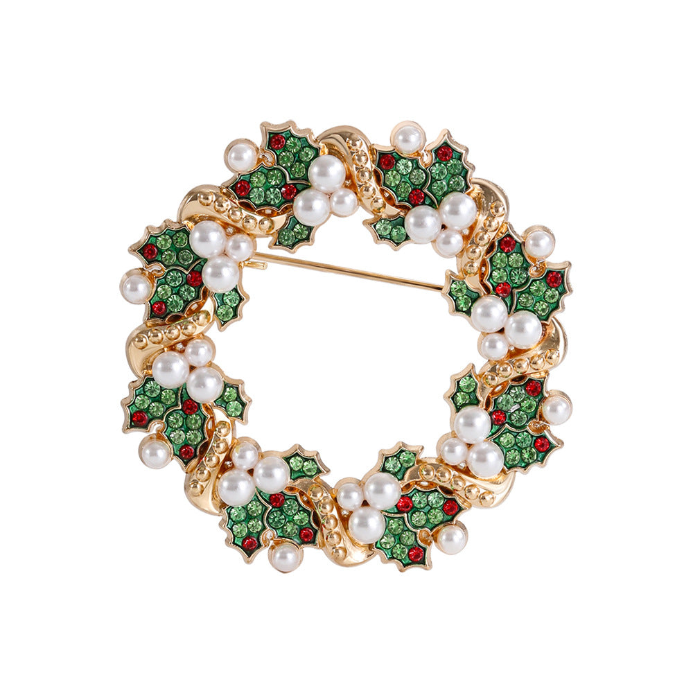 Diamond-encrusted Christmas wreath brooch for clothing, featuring sparkling stones and festive holly details