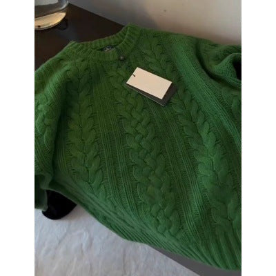 Women's loose outerwear sweater top in a relaxed fit, shown in a simple product view