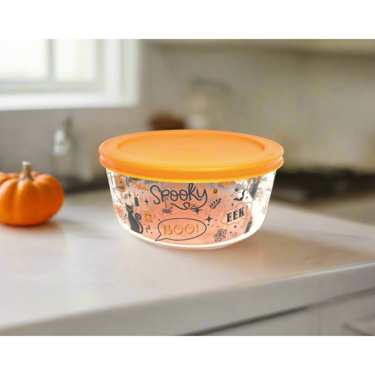 Set of four Halloween-themed round glass storage containers with lids, 32oz capacity, by Dura Living, perfect for festive kitchen storage.