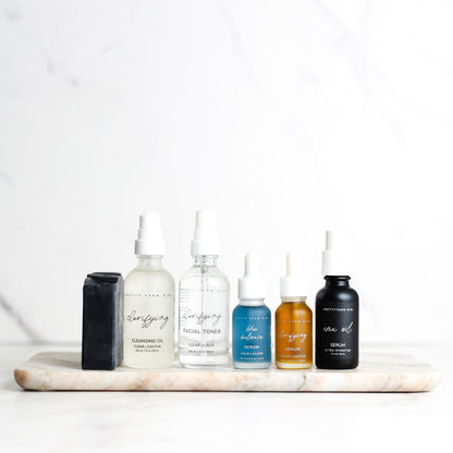 Pretty Farm Girl Acne Skin Kit full routine bundle with cleanser, toner, and treatments for clear, healthy skin.