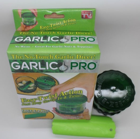 Kitchen gadget garlic peeler for removing garlic skins, shown in a compact handheld design