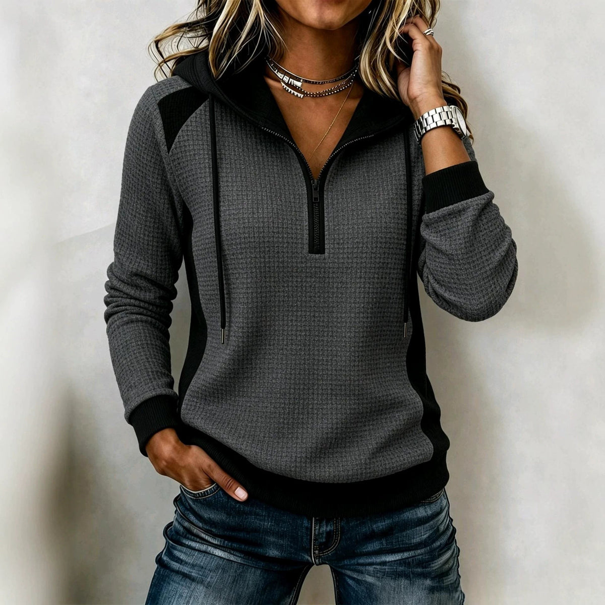 Women's waffle-knit half-zip hooded sweatshirt in a textured fabric, front view