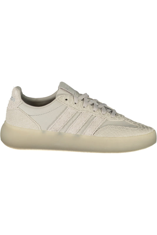 White Adidas women's sports sneakers, lightweight athletic shoes with breathable fabric and sporty design.