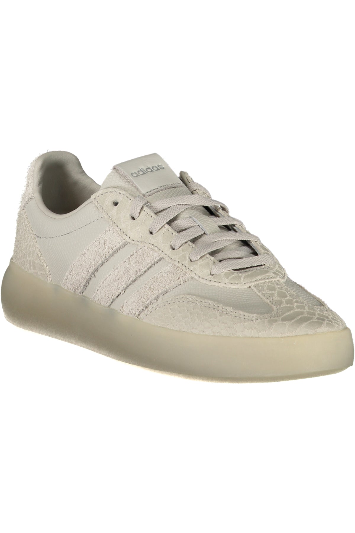 White Adidas women's sports sneakers with sleek design and comfortable fit, perfect for active wear and casual outings.