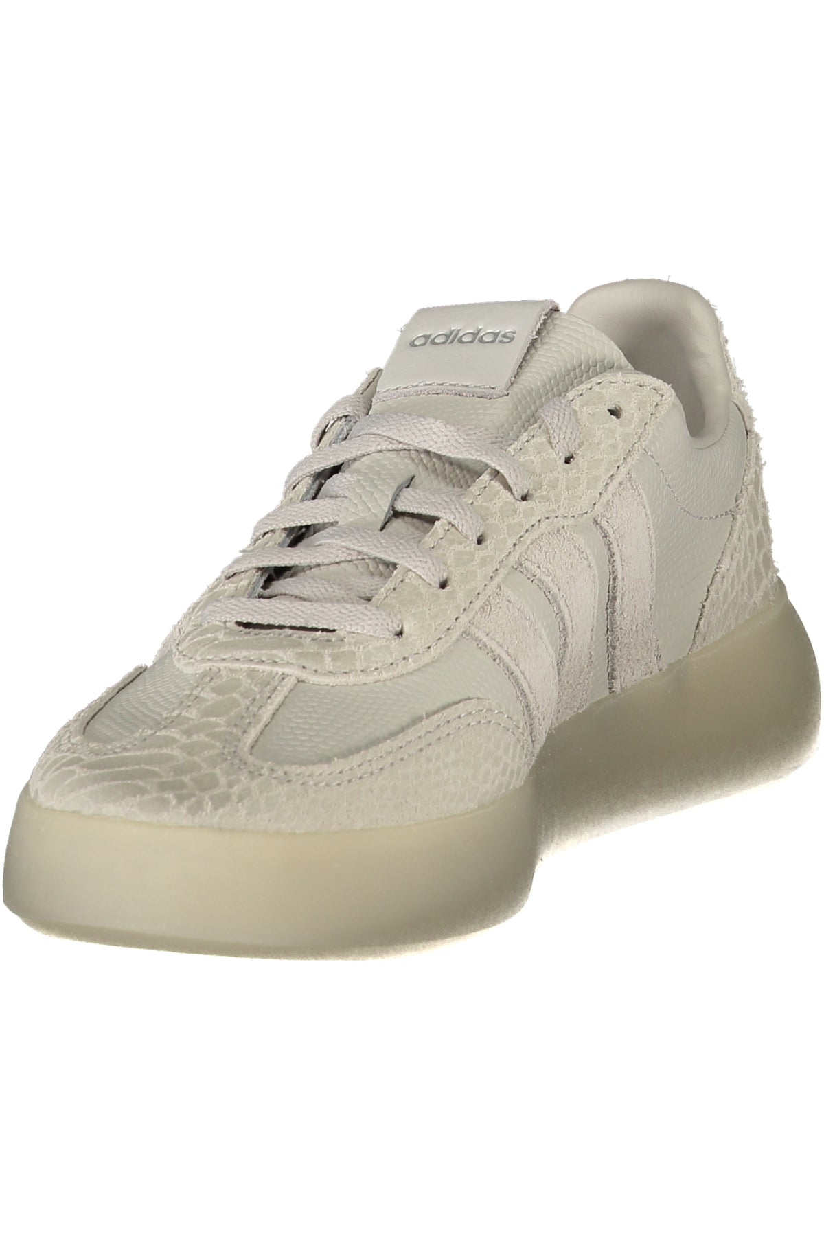 White Adidas women's sports sneakers featuring a sleek design and comfortable fit, perfect for active and casual wear.