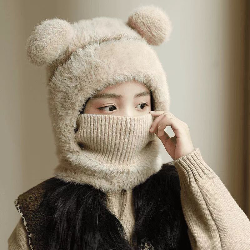 Warm windproof knitted wool hat with earflaps in a cozy textured design