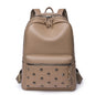 Women's designer anti-splash PU leather backpack by BACKUPMYFILESNOW® with adjustable straps and sleek modern design.