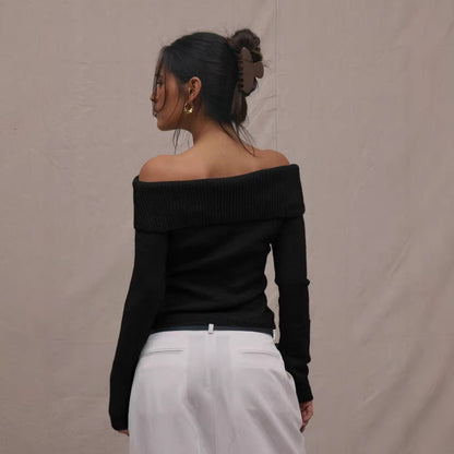 Figure-flattering slimming short-length long-sleeve top in a sleek silhouette