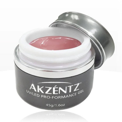 Akzentz Pro-Formance Balance Foundation Blush in Warm Pink, 7g / 45g, with soft pink powder and compact case.